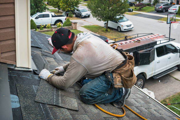 Professional Gutter Repair And Installation technician working in Estes Park, CO